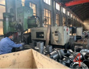 workers in machining workshop