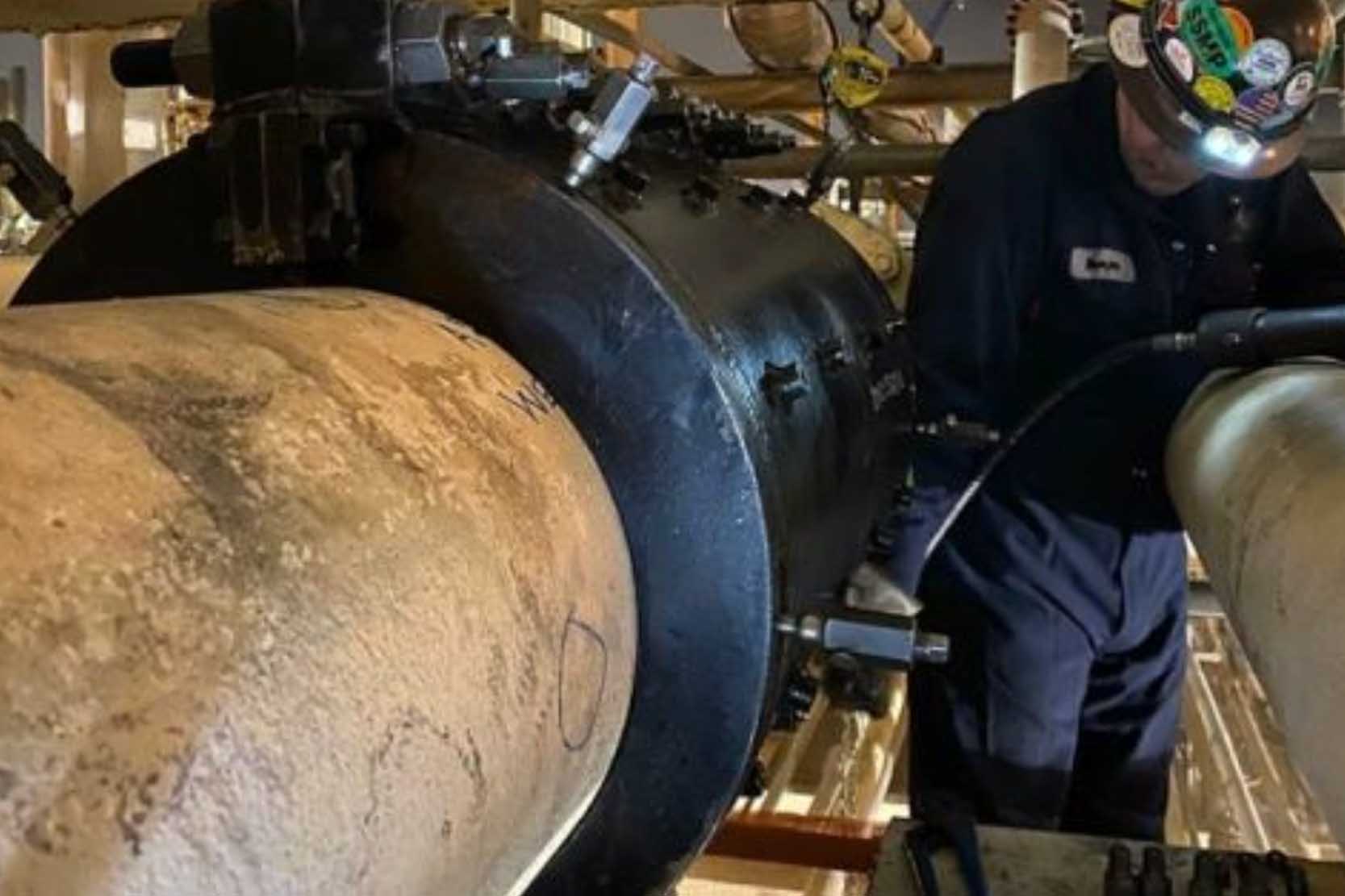 A high pressure pipeline in an industrial setting