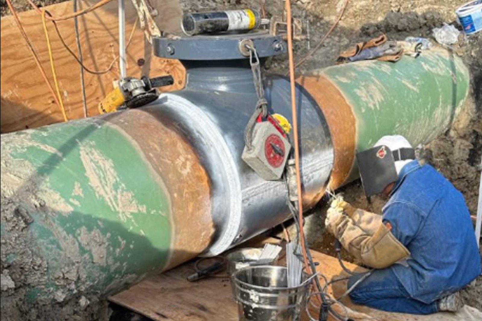 A large diameter steel pipe with a welded branch connection
