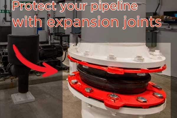 An expansion joint installed on a long, above-ground pipeline