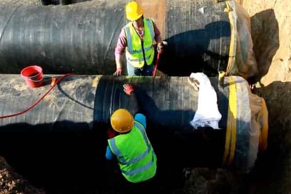A corroded pipe joint showing the effects of galvanic corrosion